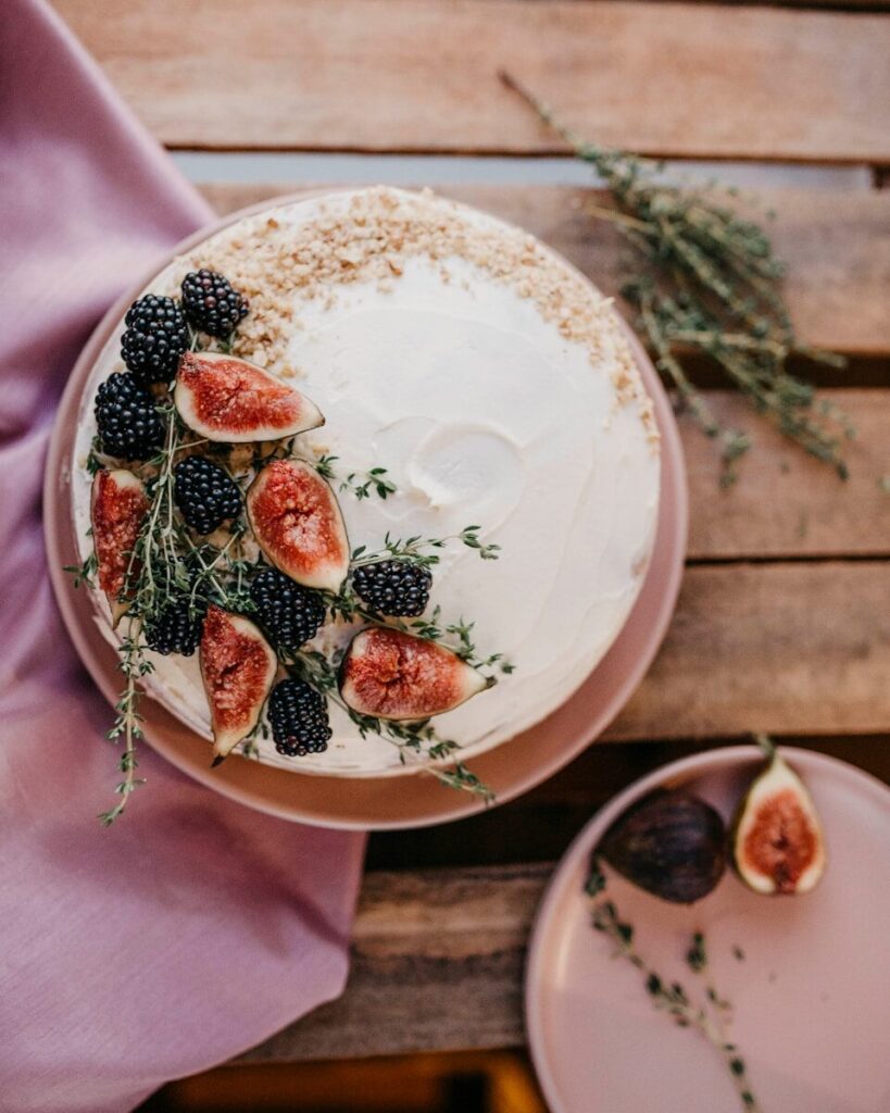 white and red floral ceramic plate